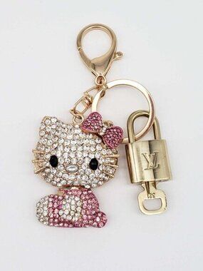 Louis Vuitton Gold Lock 🔒 Authentic LV Key + Unbranded Hello Kitty Bag Charm